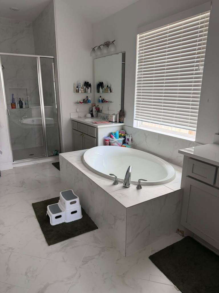 Detailed shot of a sparkling clean kitchen countertop and stainless steel sink reflecting light after professional deep cleaning