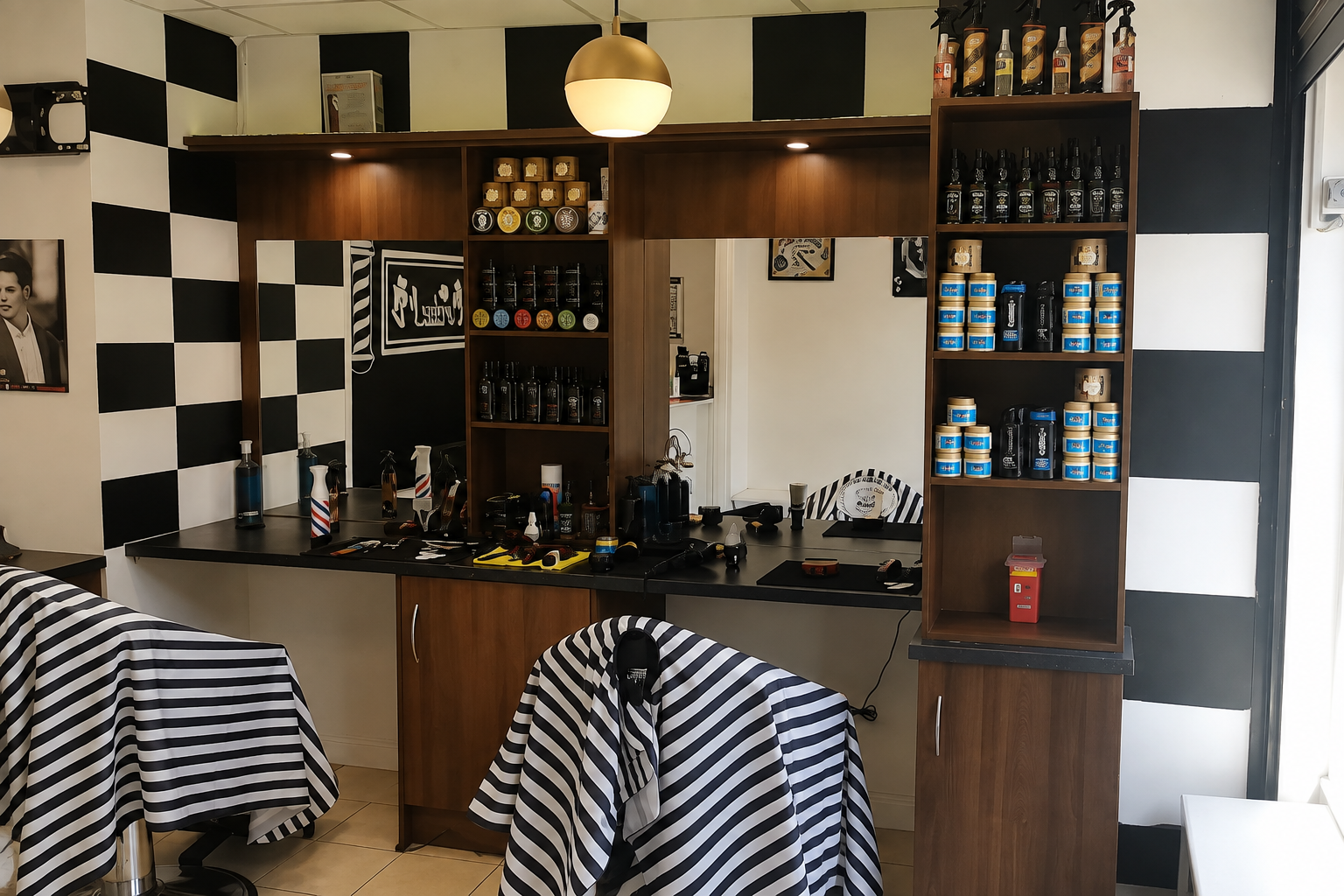 Elegant dark luxury Turkish barbershop interior with gold accents leather chairs and vintage mirrors in Trim Ireland