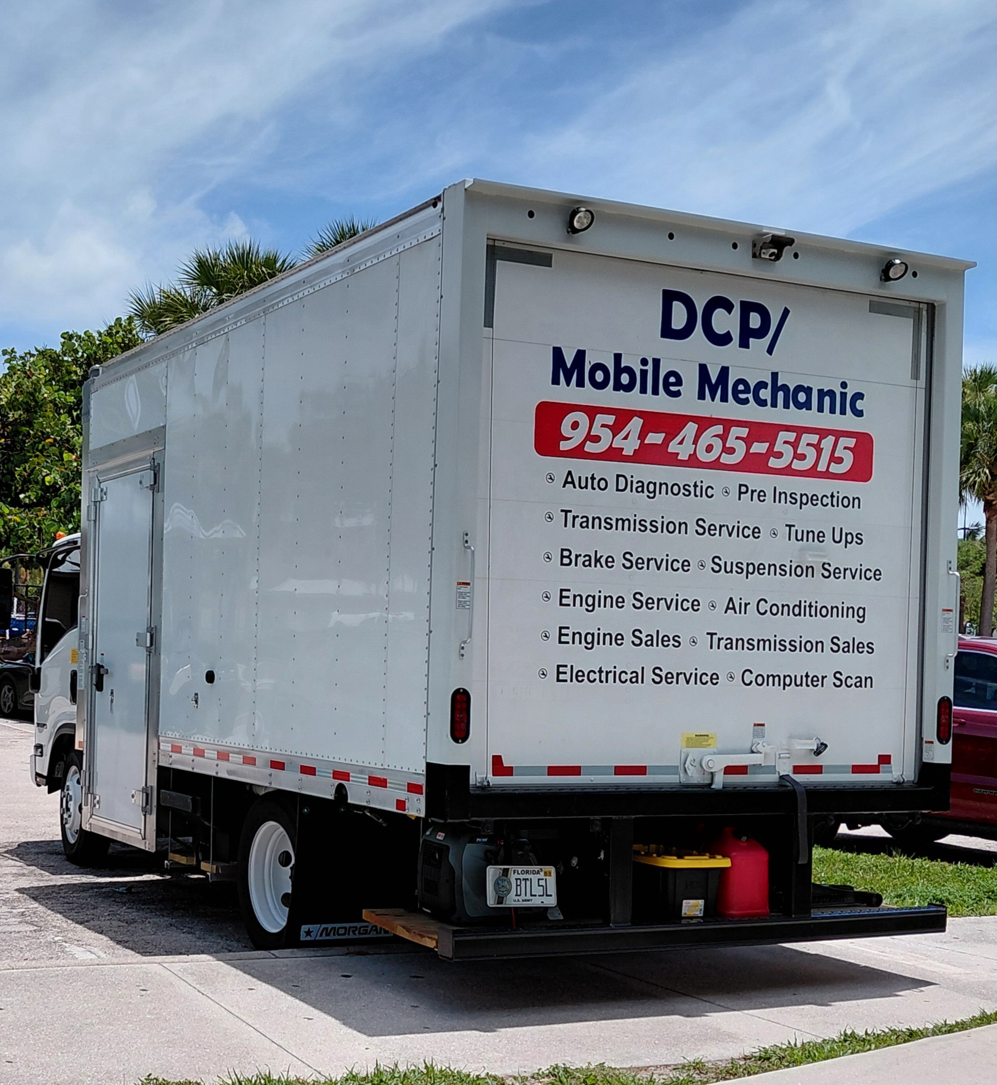 DCP Mobile Mechanic service van driving on a highway in South Florida