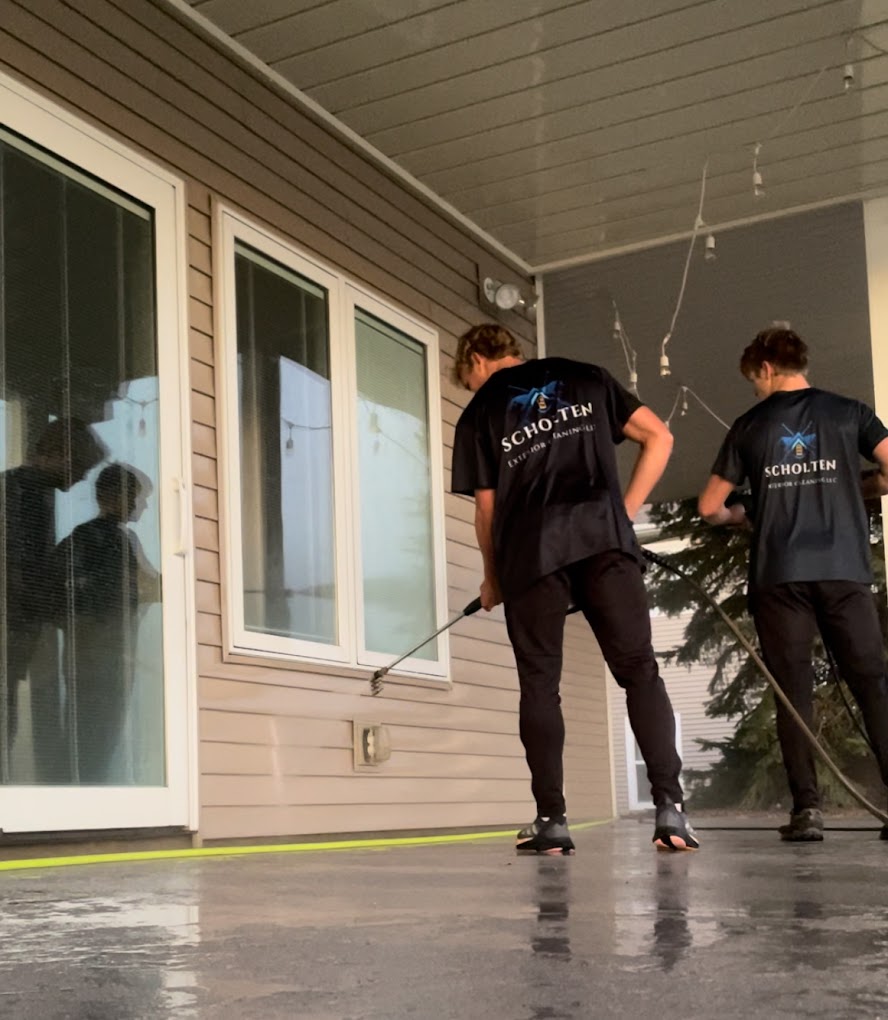 Pristine home exterior showcasing immaculate siding and gleaming windows after premium washing services