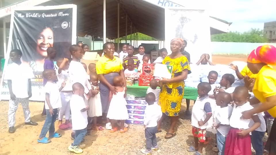 Volunteers serving children at the Peter Antwi Foundation