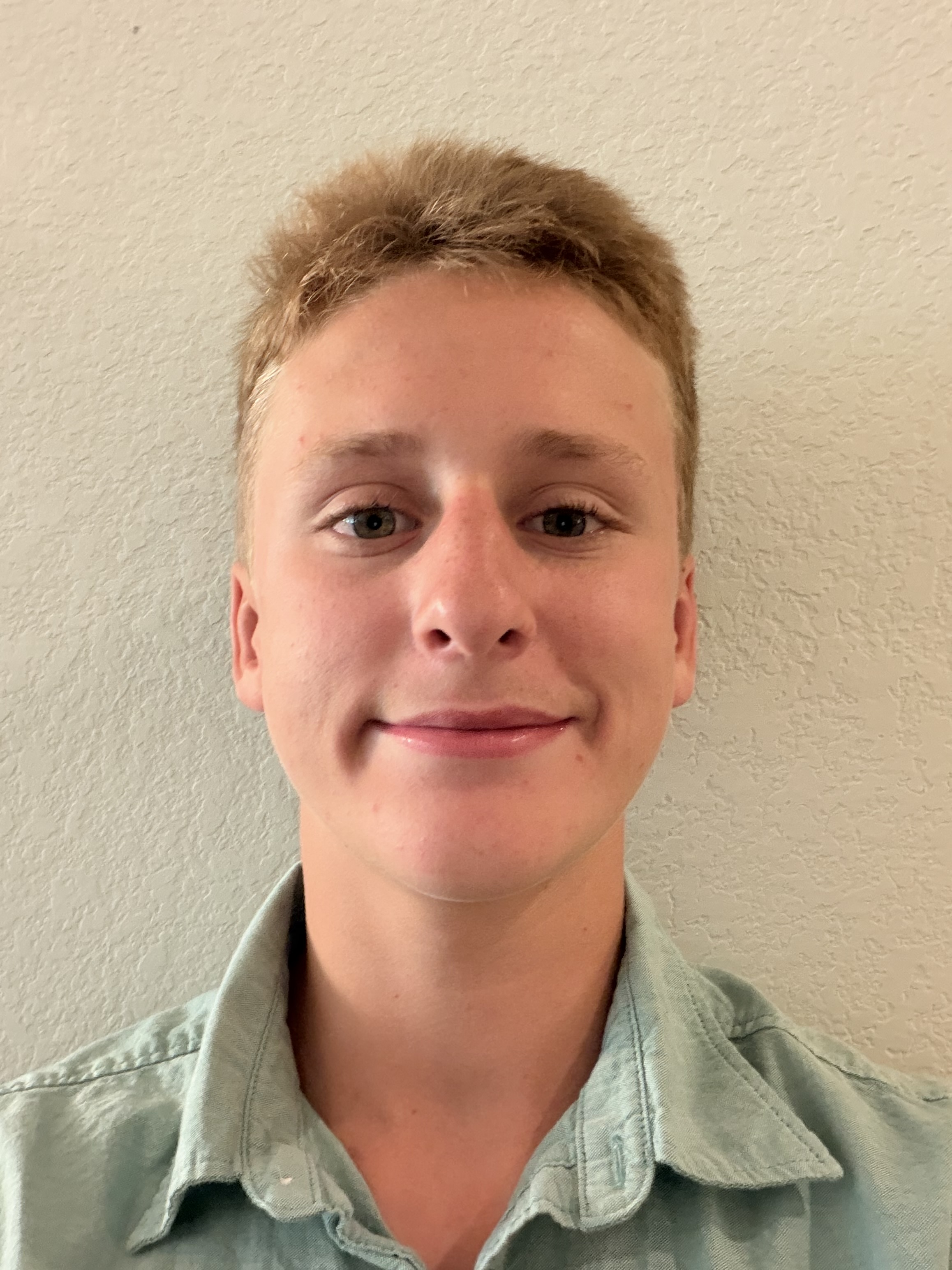 Karter co-founder portrait of young web developer in modern studio setting with confident expression