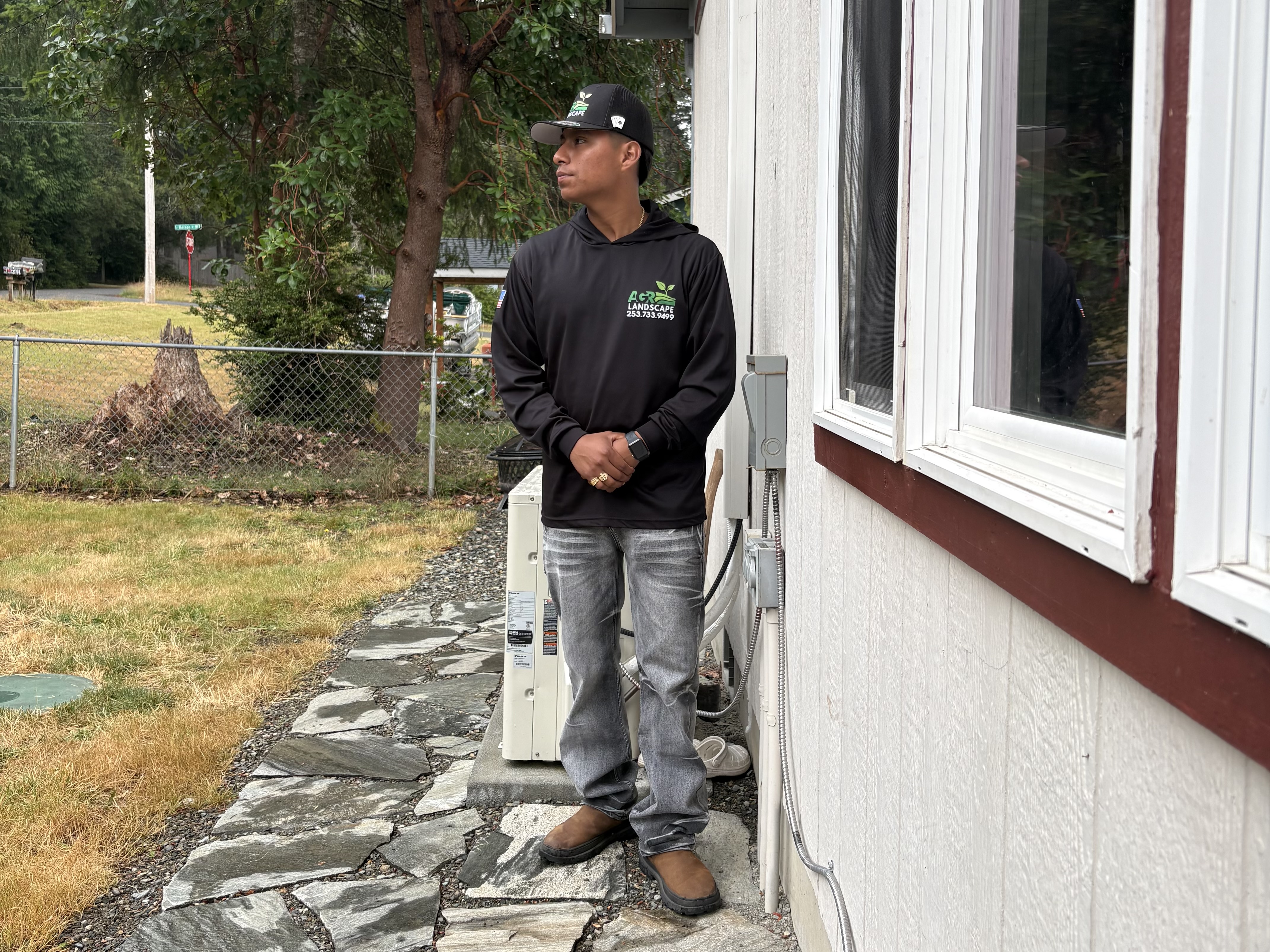 AGR Landscape owner on-site inspecting completed hardscape project