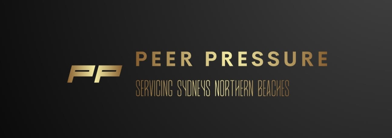The young and professional Peer Pressure NB team based in Avalon Sydney standing confidently with their modern pressure washing equipment on the Northern Beaches