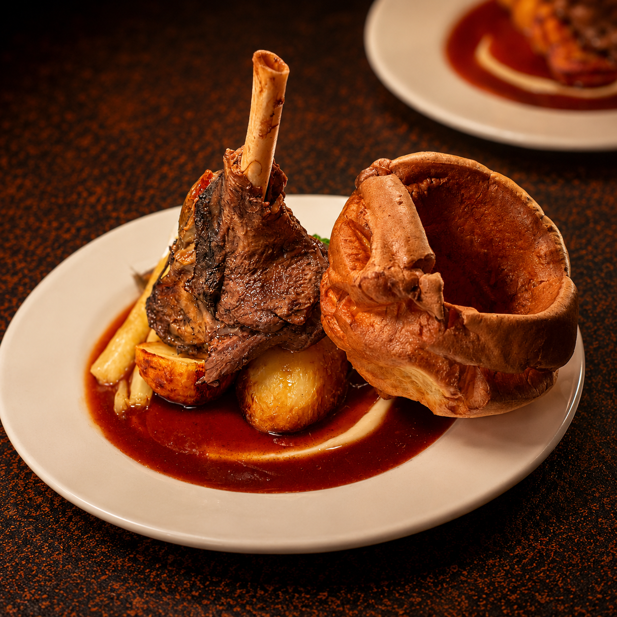 Traditional Sunday roast with Yorkshire pudding, roast potatoes and rich gravy