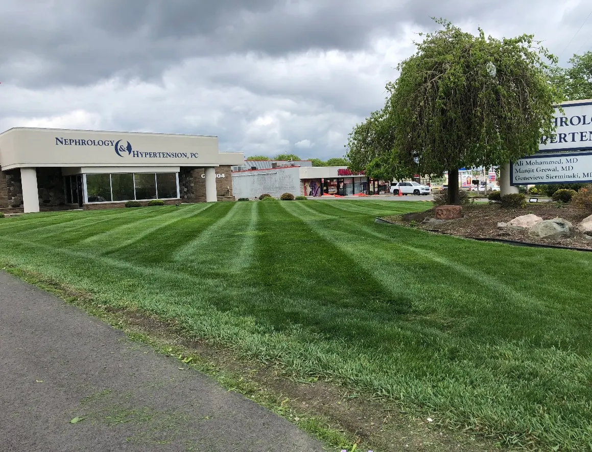 Miracle Makers professional landscaping crew maintaining a lush residential property