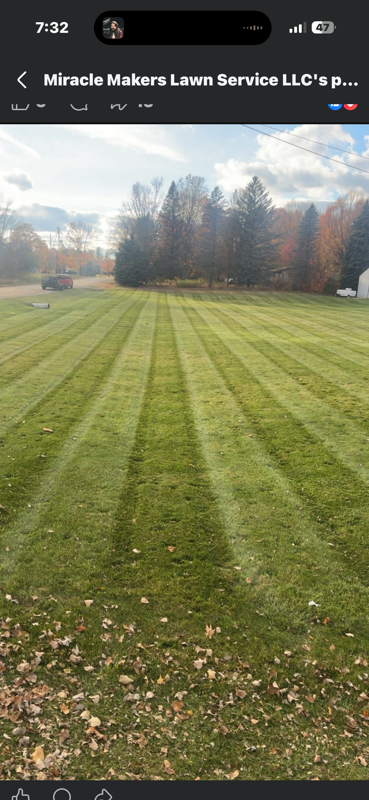 Perfectly mowed residential lawn demonstrating professional striping patterns