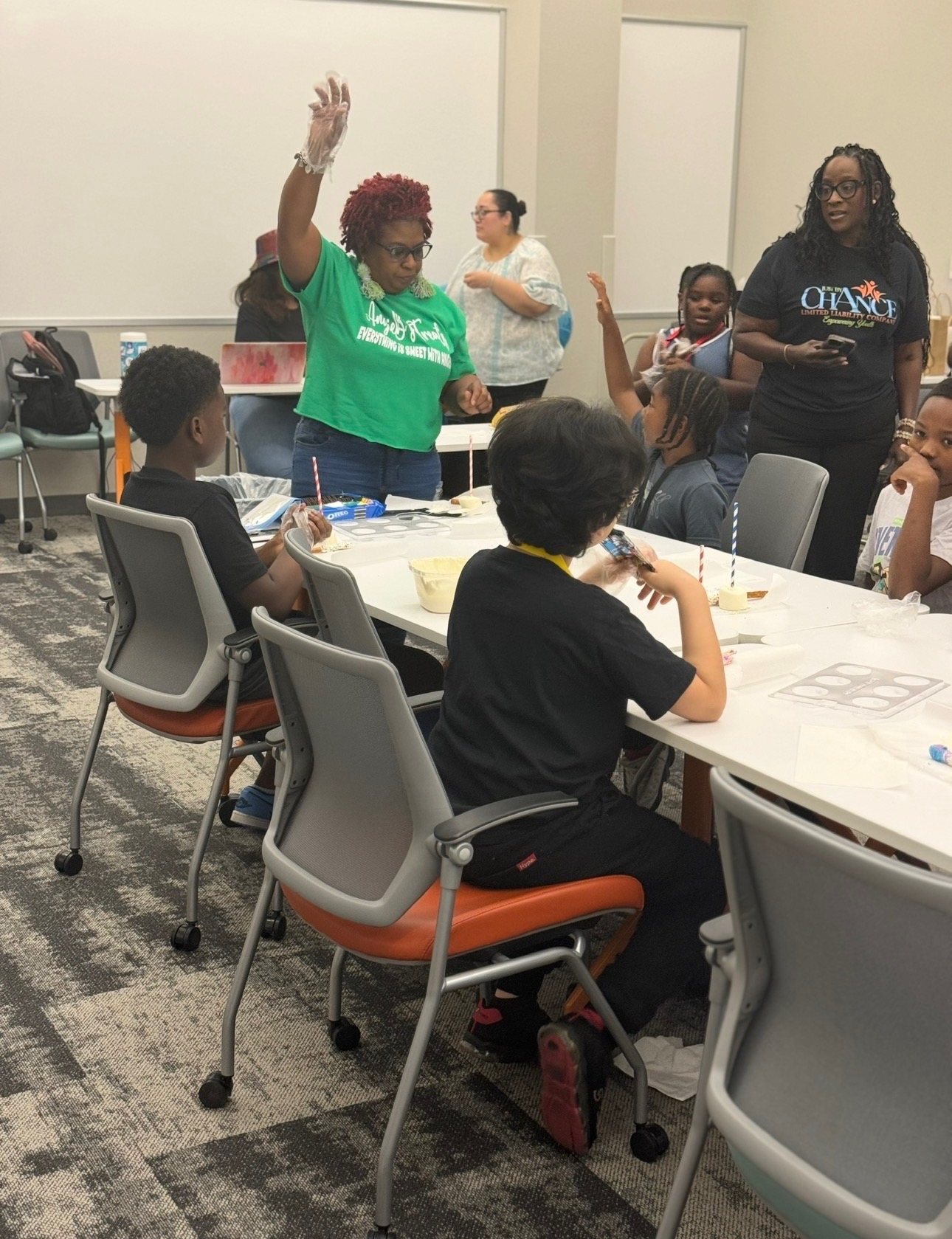 Diverse group of smiling teens engaged in a positive mentorship program