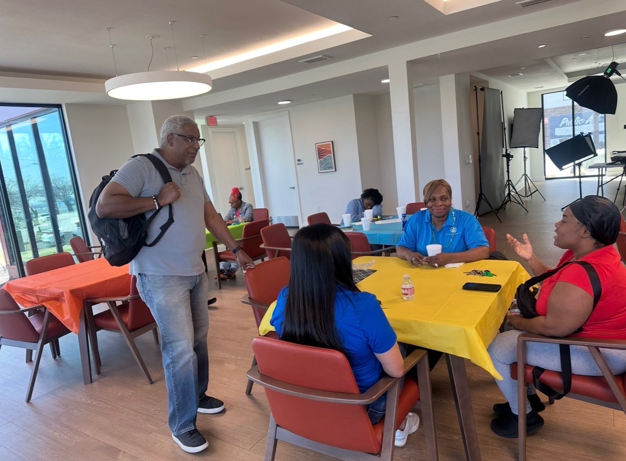 Joyful family and youth celebrating an empowering moment together during a community event, showing connection, hope, and unity