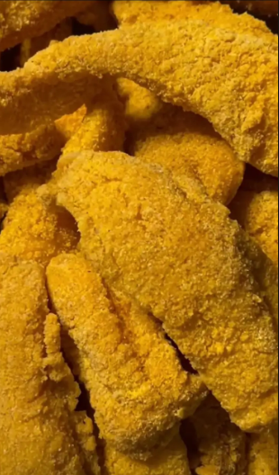 Lightly seasoned and fried swai fish fillet served with lemon and tartar sauce